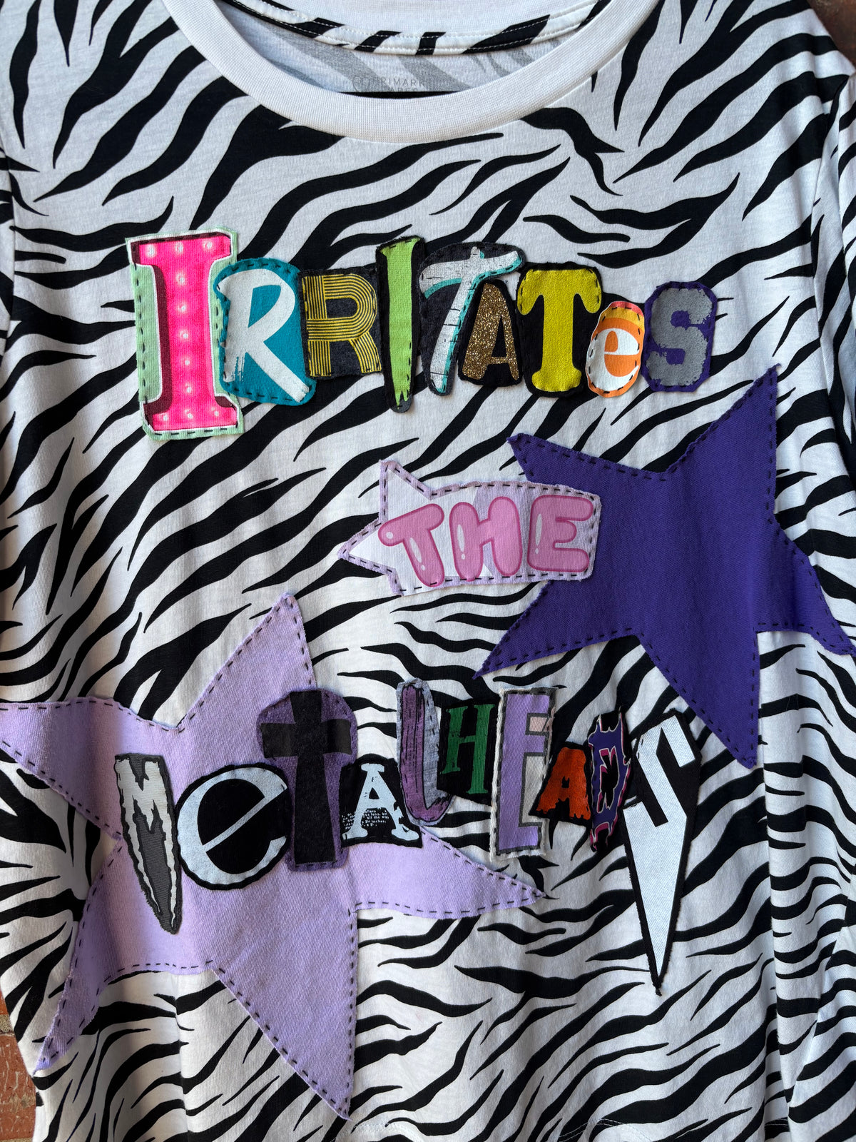 Irritates The Metalheads Tee - (Zebra L)